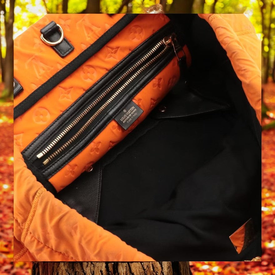 Louis Vuitton Neoprene Scuba shopping bag in orange monogram canvas and black leather