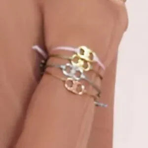 "TORY BURCH" EMBRACE AMBITION BRACELET (UNISEX)