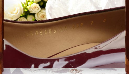 Salvatore Ferragamo Vara Bow Pumps in Burgundy Patent Leather