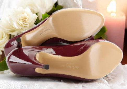 Salvatore Ferragamo Vara Bow Pumps in Burgundy Patent Leather