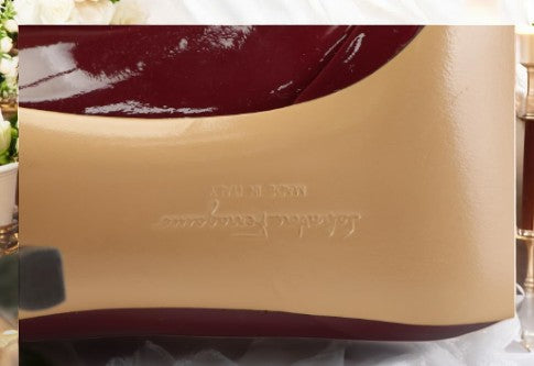 Salvatore Ferragamo Vara Bow Pumps in Burgundy Patent Leather